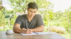 student writing SOP motivation letter scholarship month four preparation 2026