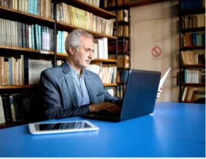 professor reading student email PhD supervision research university 2026