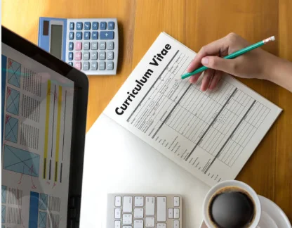scholarship CV resume academic professional student desk writing 2026